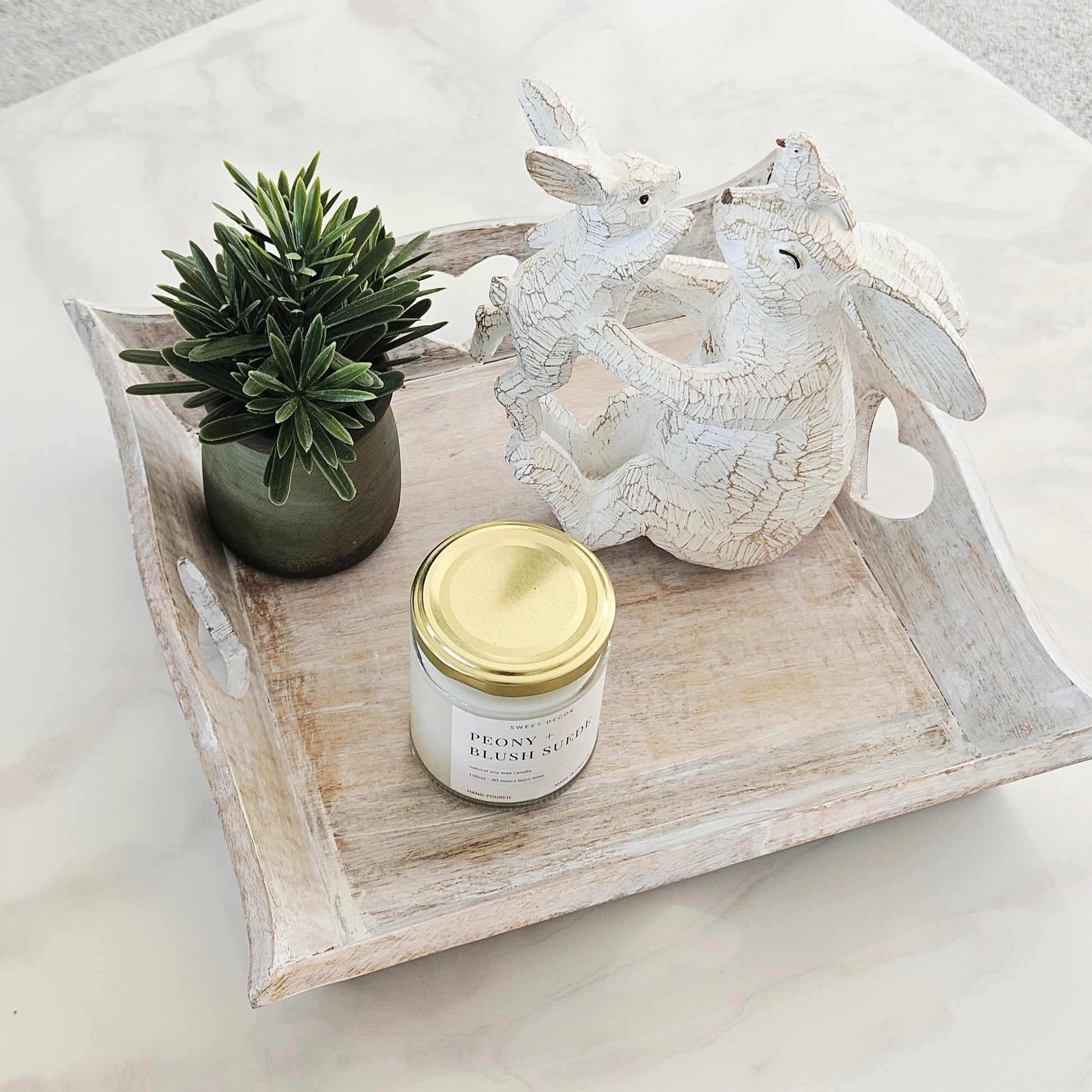 decorative rustic tray with hearts on each side of the wavy square shape