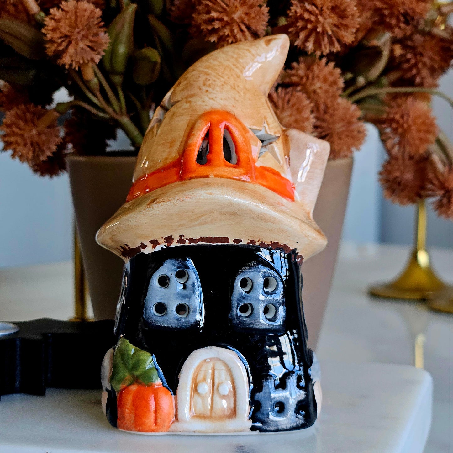 Witch's Hat Ceramic LED House Halloween decorative light-up ornament for seasonal home décor.