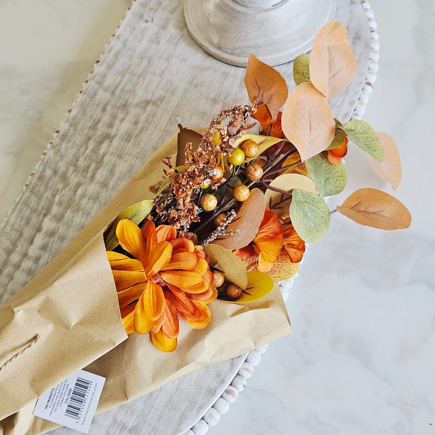 Russet autumnal foliage bouquet with artificial leaves and berries for autumn vase displays and seasonal home décor