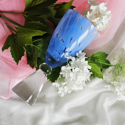 ocean blue drinking glass with thick stem bottom