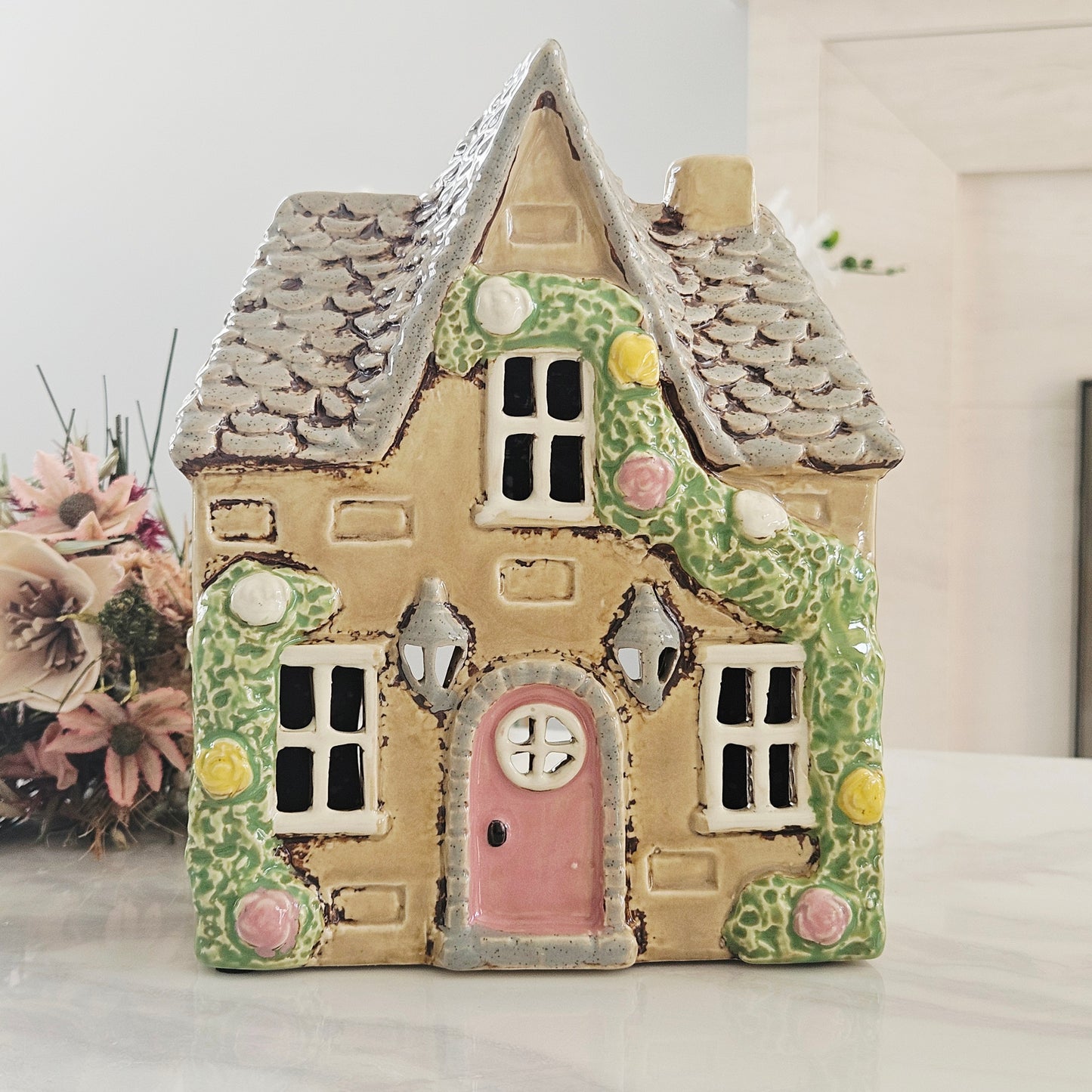 rose garland stoneware large cottage with lanterns and flowers and a pink door tea light holder