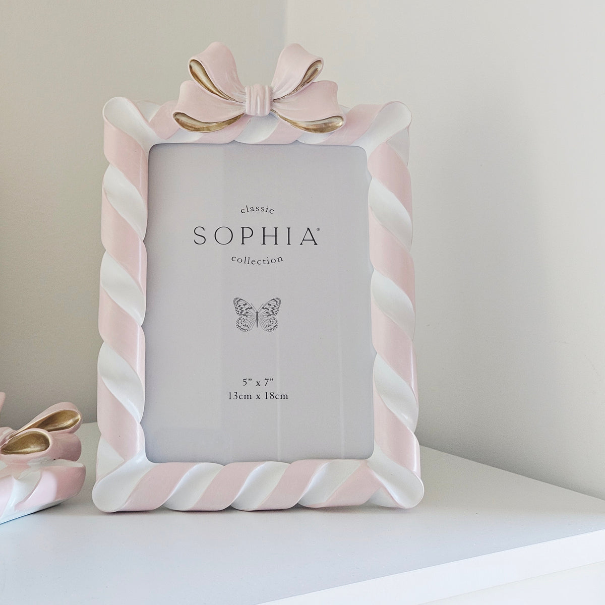 Pink resin photo frame with decorative bow 5 x 7 inch