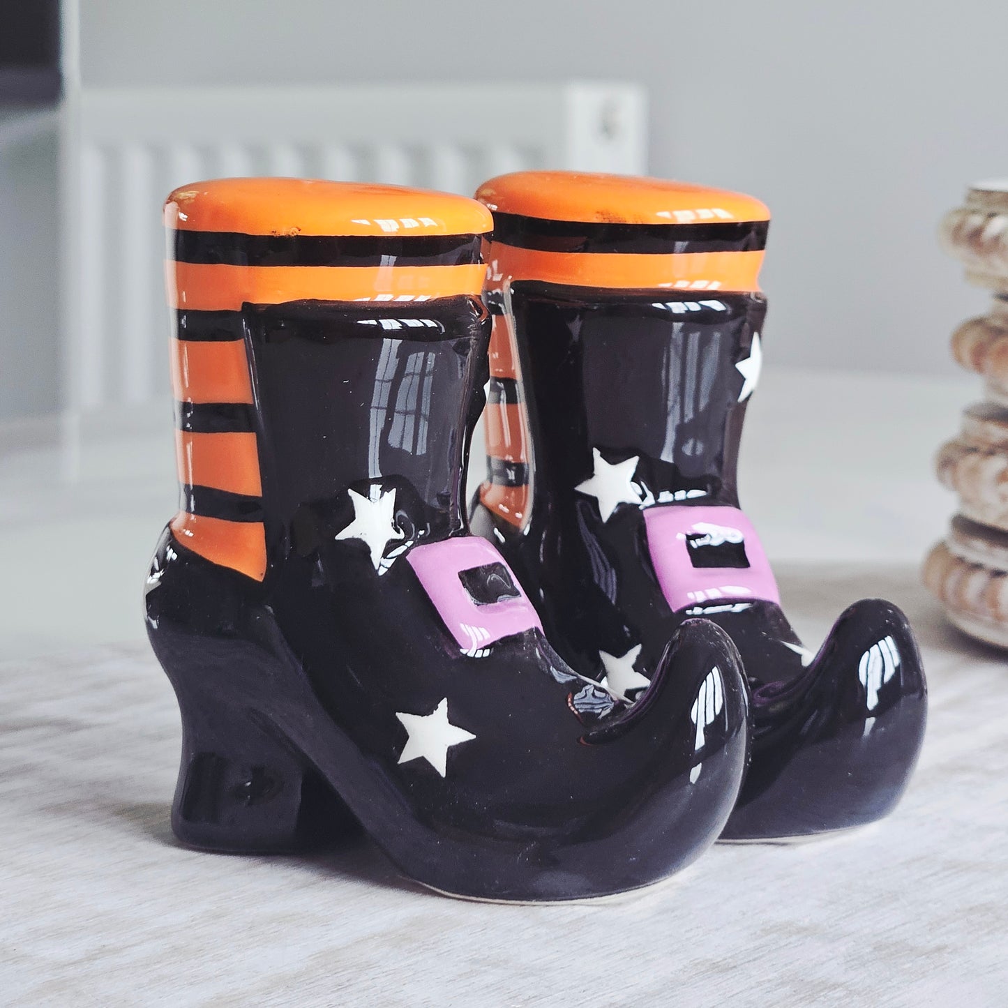 Witch boot salt and pepper shakers with orange tops and black boots salt n pepper shakers
