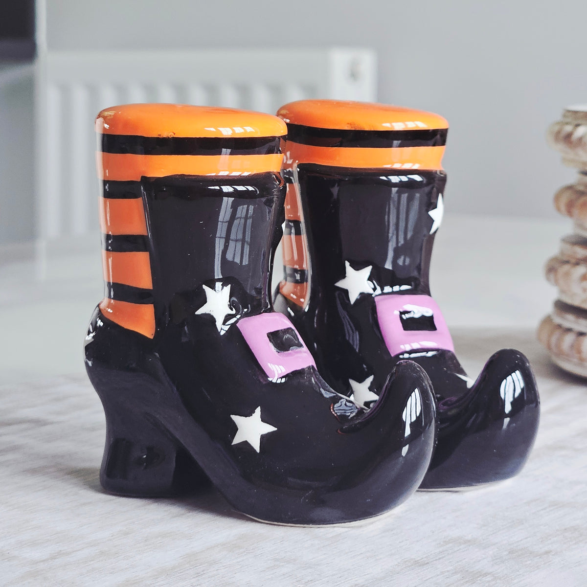 Witch boot salt and pepper shakers with orange tops and black boots salt n pepper shakers
