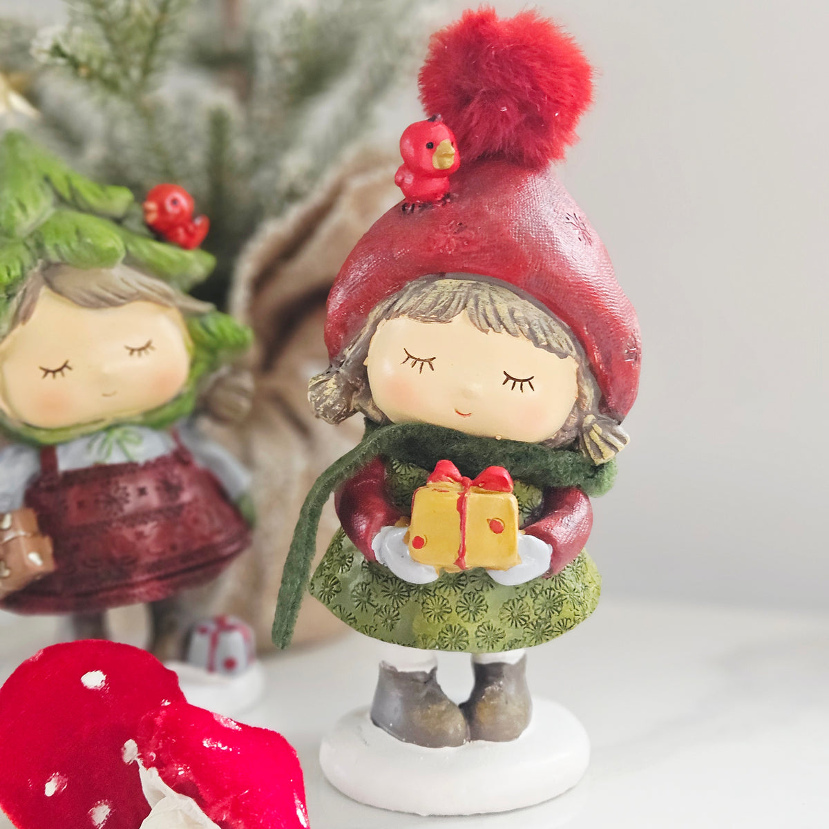 Standing Resin Christmas Girl with Gift, Scarf & Pom Pom Hat