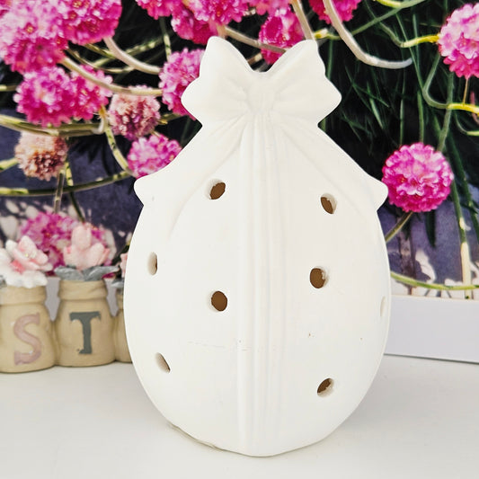 Decorative led lamp shaped like an easter egg and a bow on top,