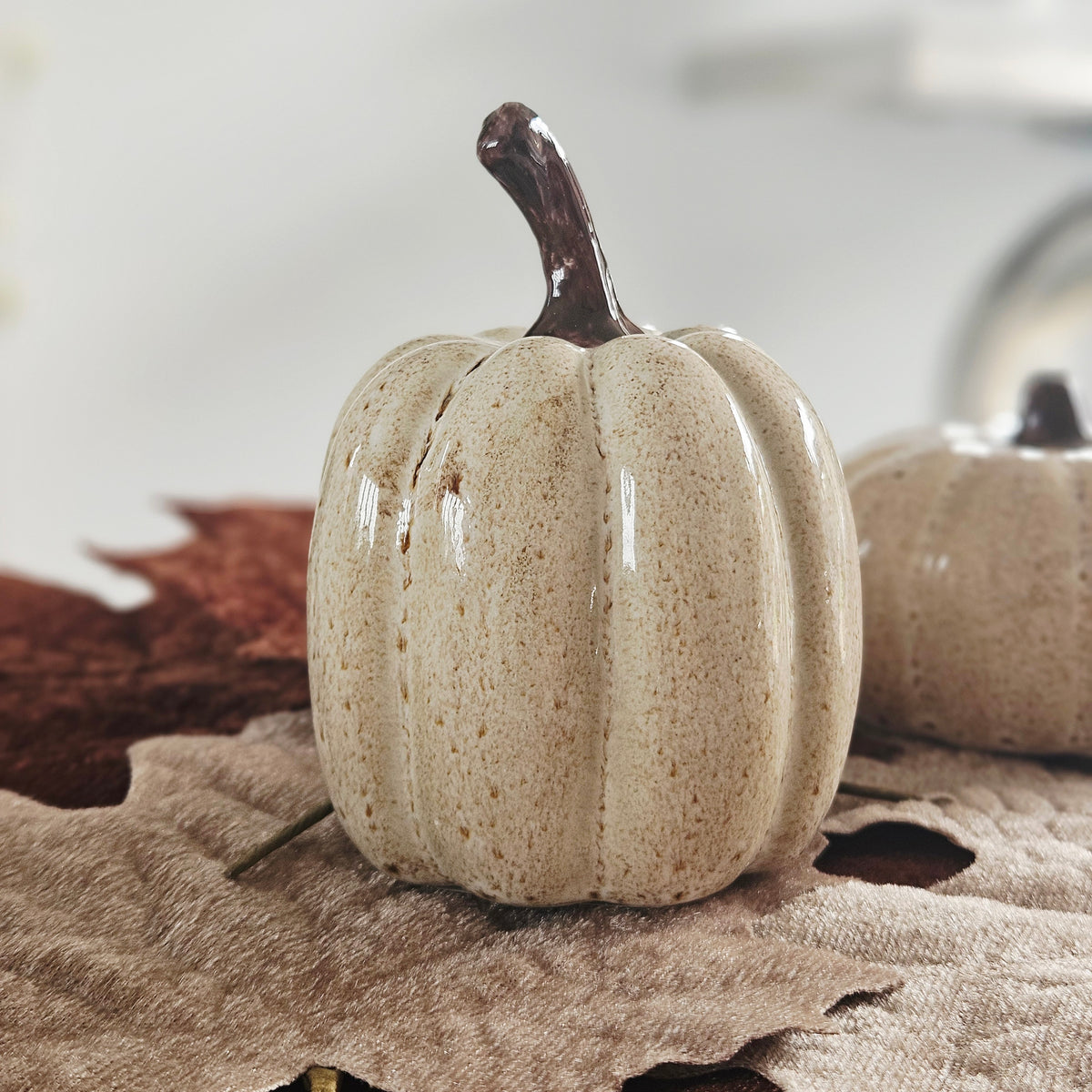 Beige ceramic pumpkin decoration for autumn and Halloween home decor