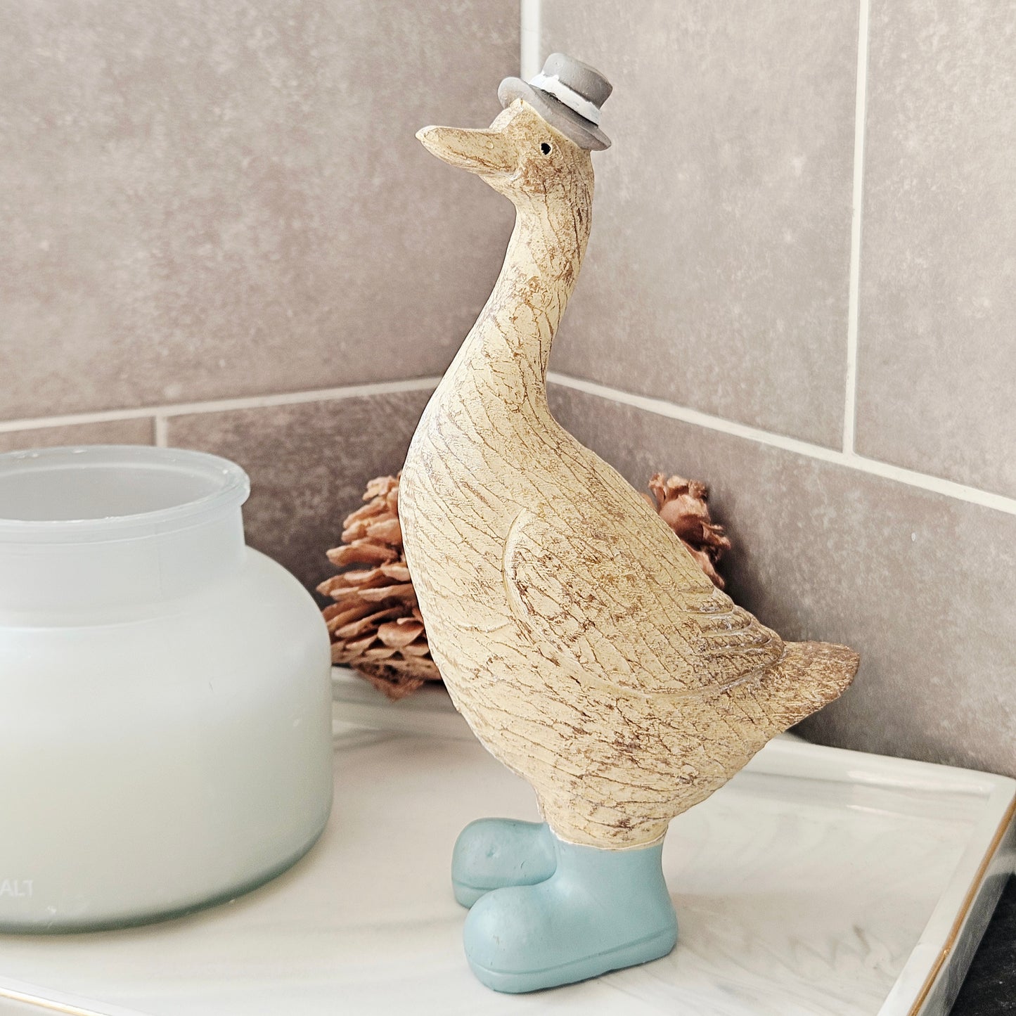 Decorative duck figure with a top hat on and wellies 20cm
