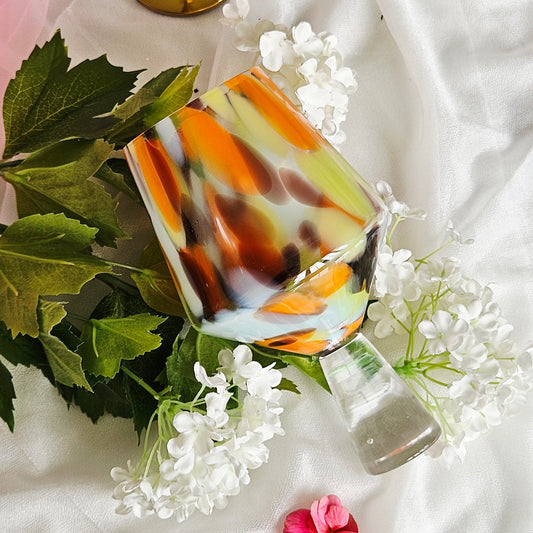 orange fleck gin glass with thick stem