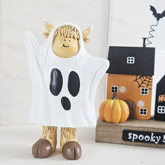 highland cow ornament dresses as a ghost