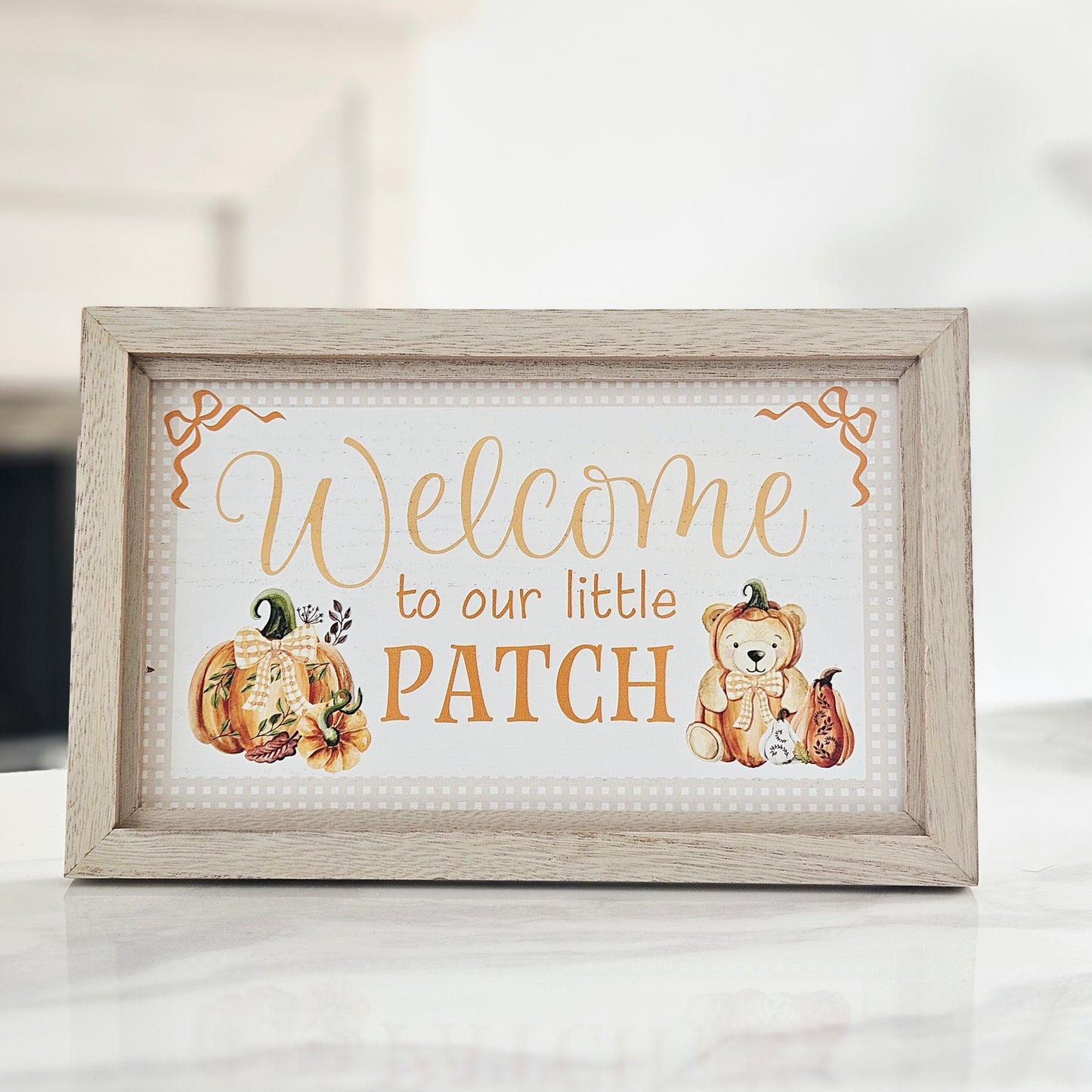 Harvest Home Welcome to Our Patch wooden framed easel plaque with rustic autumn pumpkin design for farmhouse fall home décor.