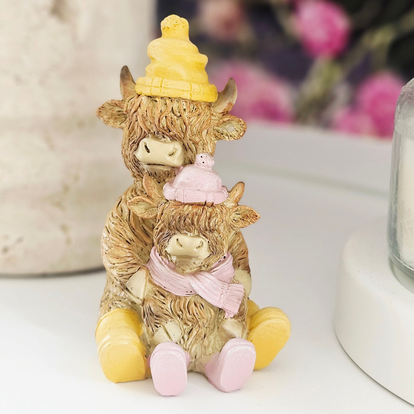 Highland cow resin double raincoat family ornament with two cows wearing matching coats
