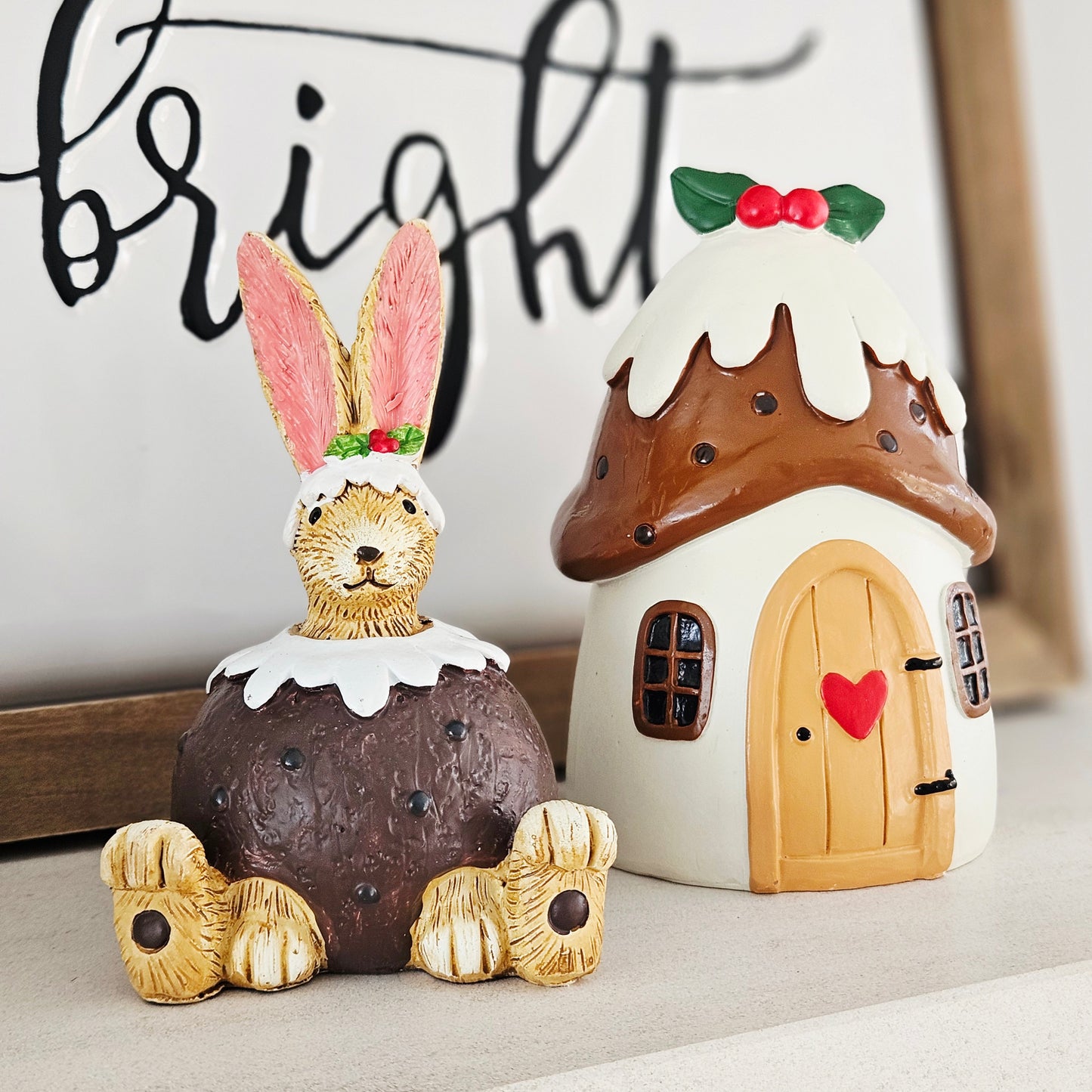 decorative jasper bunny dressed in a christmas pudding design with holly
