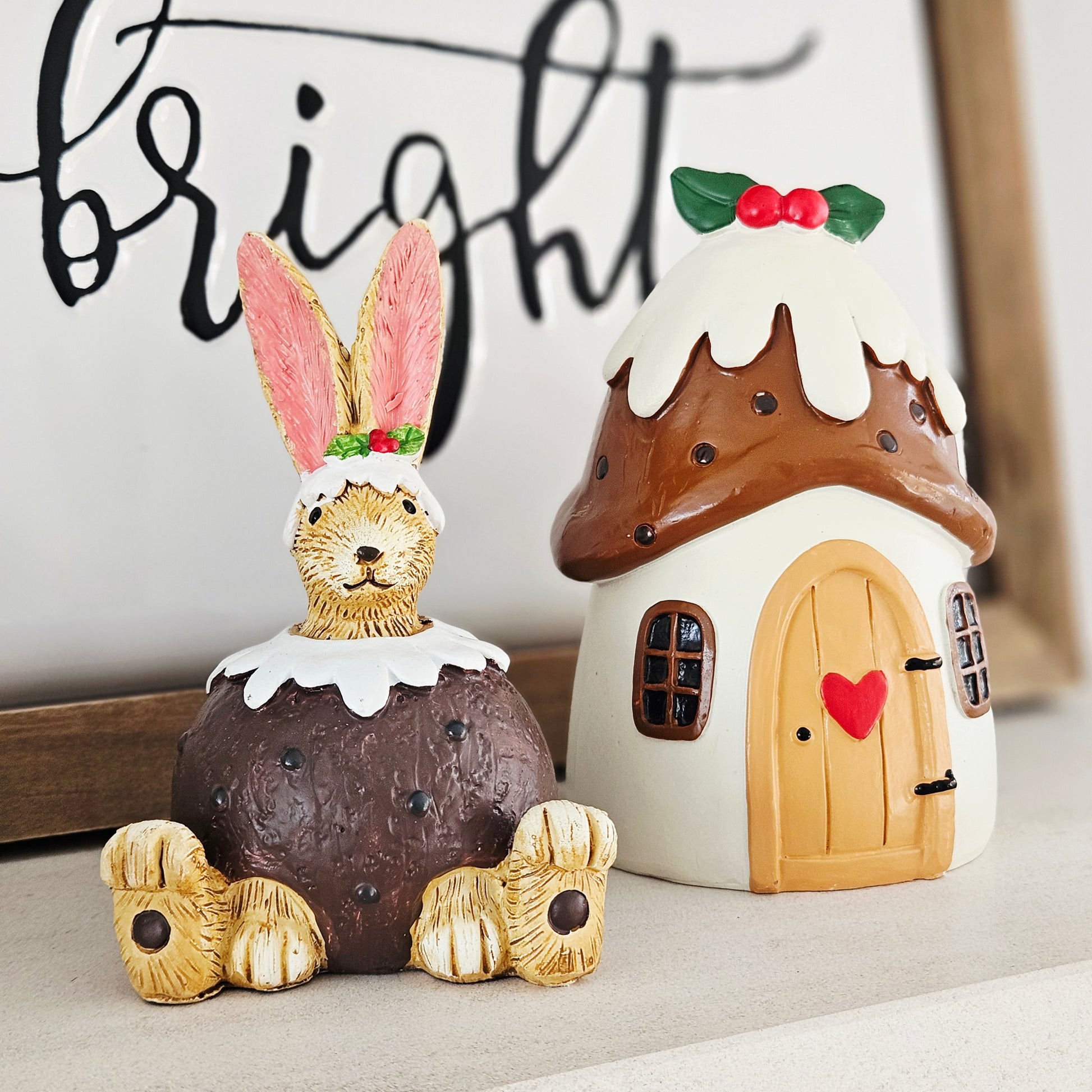 decorative jasper bunny dressed in a christmas pudding design with holly