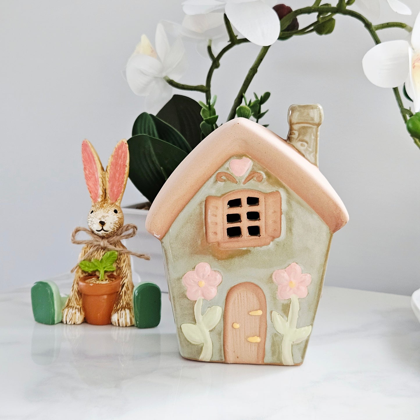 Decorative ceramic fairy tea light  house in green with chimney 