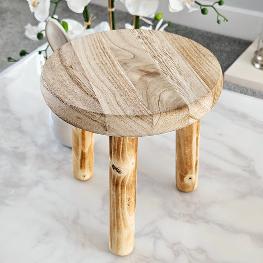 natural wood mini styling stool with round top and 3 wooden legs
