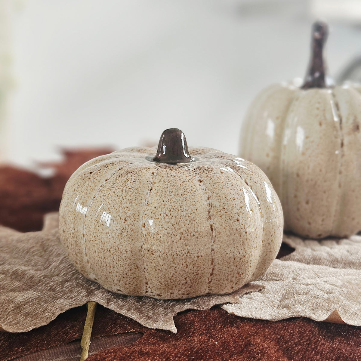 Beige ceramic pumpkin decoration for autumn and Halloween home decor