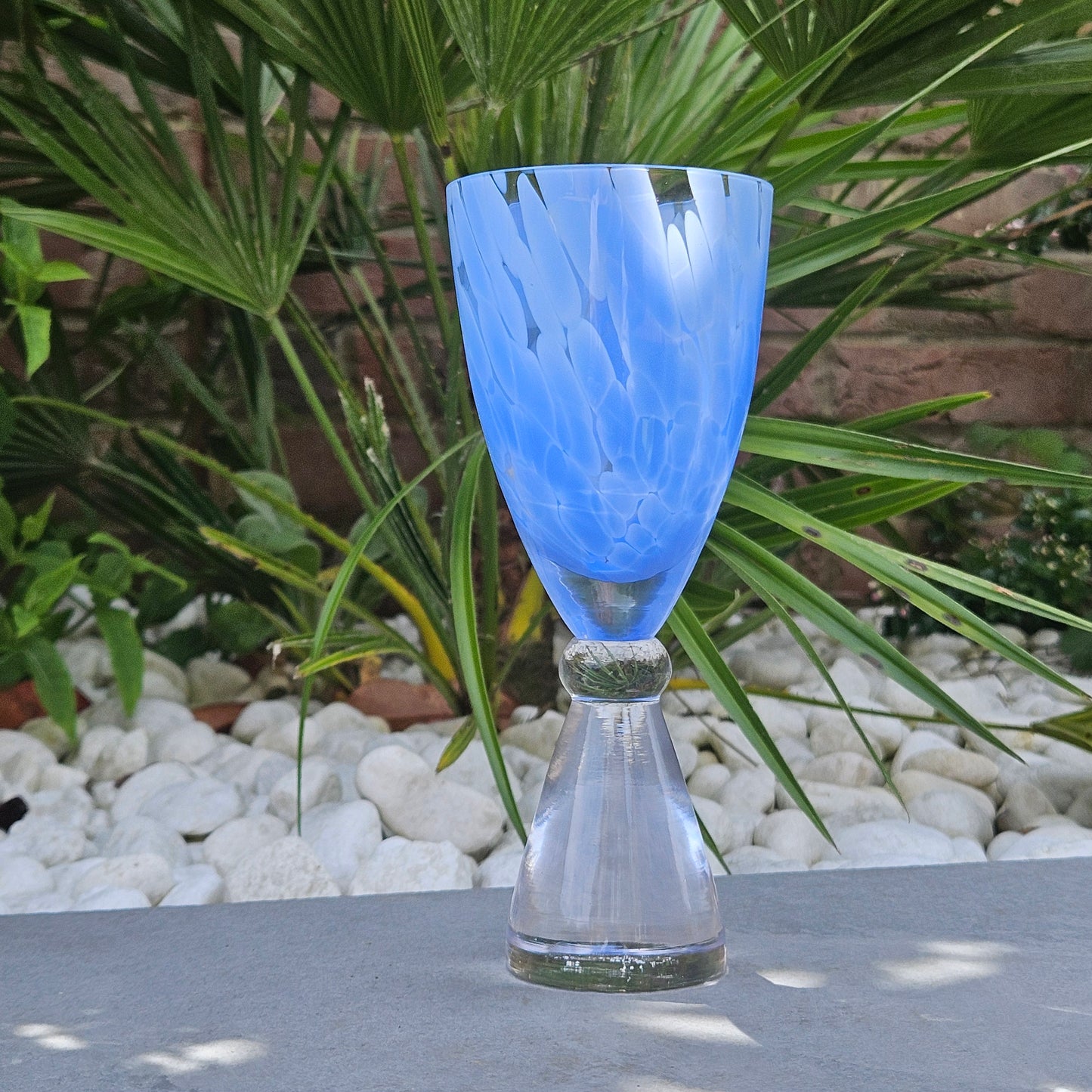 ocean blue drinking glass with thick stem bottom
