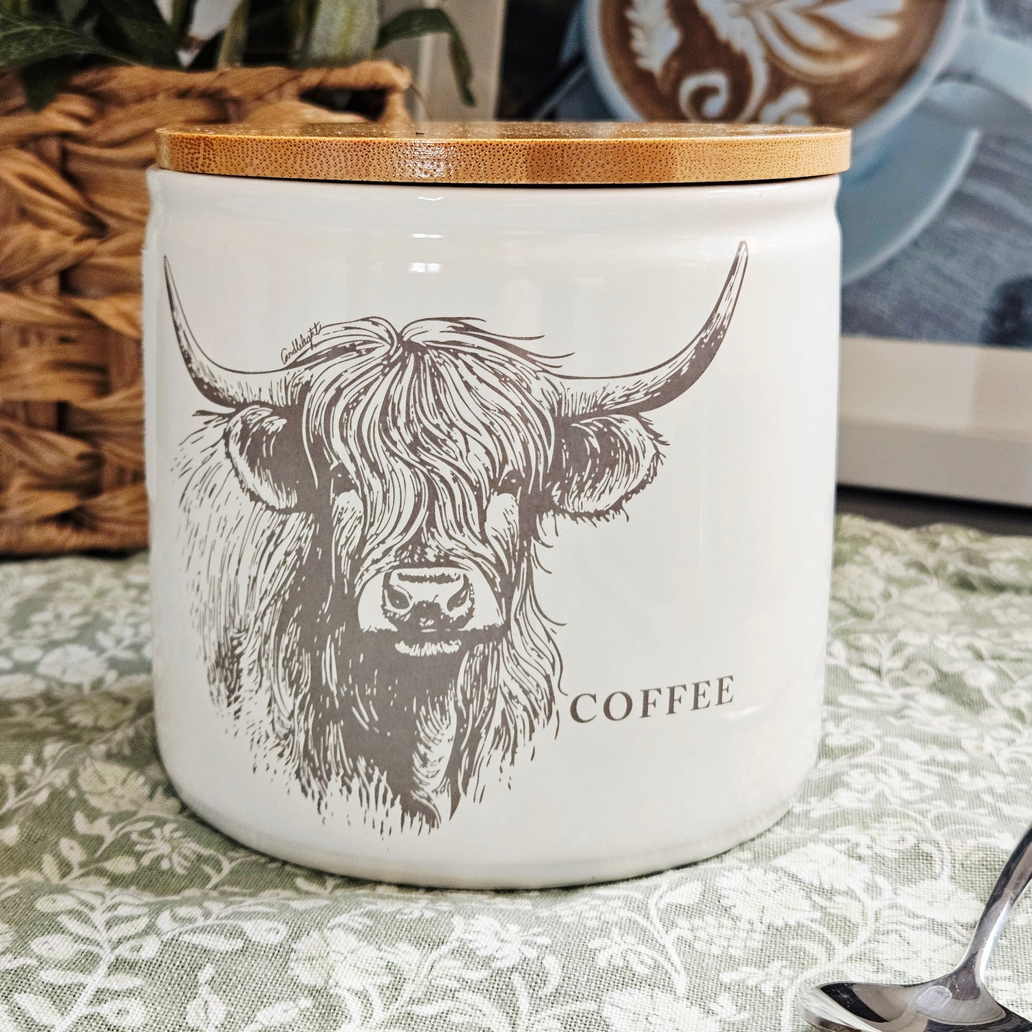White coffee canister with highland cow design and wooden lid 