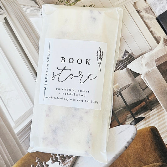 wax melts meleri and maple snap Bar of  'Book Store' label on an open book