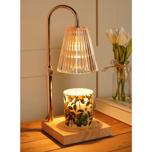 The Wax Company reeded glass candle warming lamp with gold stem and wooden base