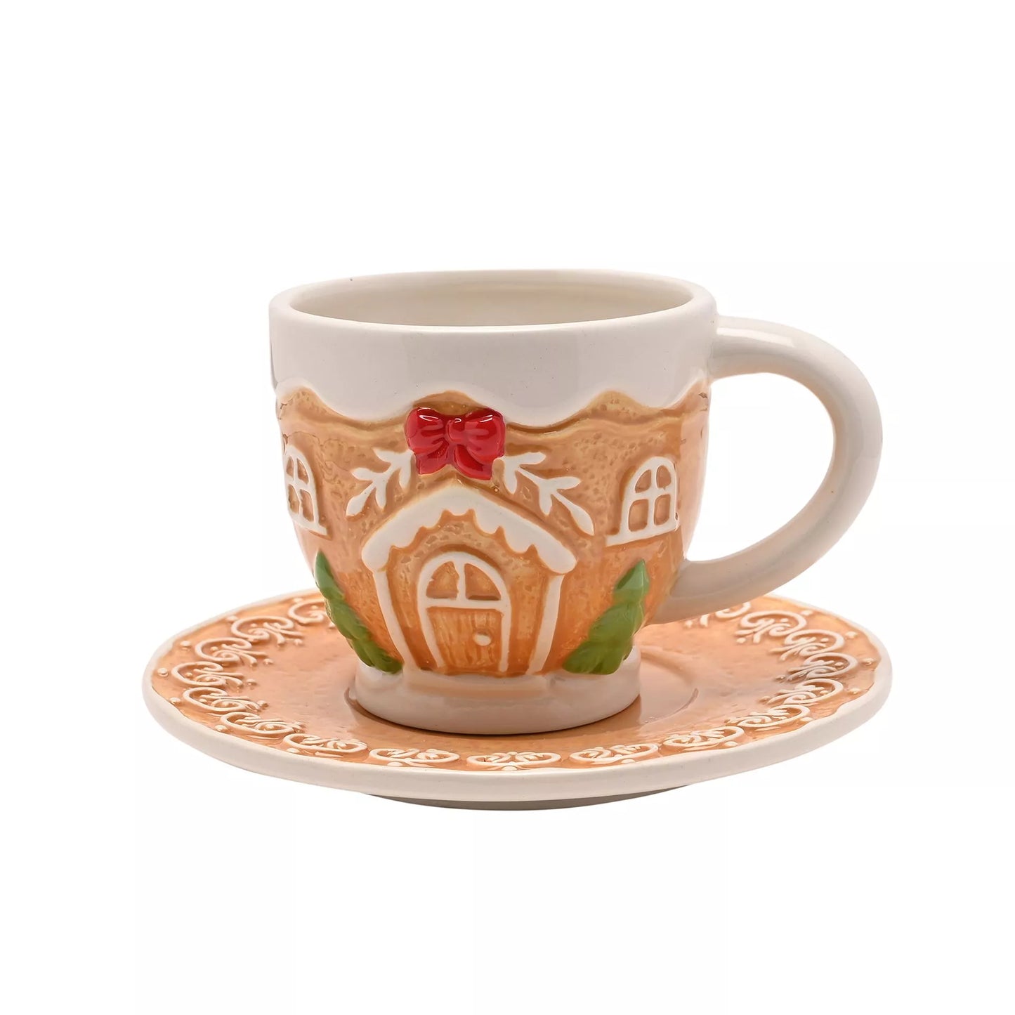 Gingerbread house-themed mug and saucer set with red bow