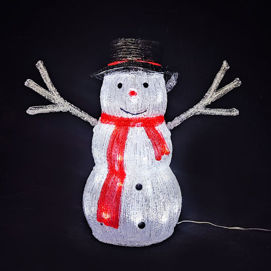 Decorative light up snowman with a red scarf and black top hat and twig arms