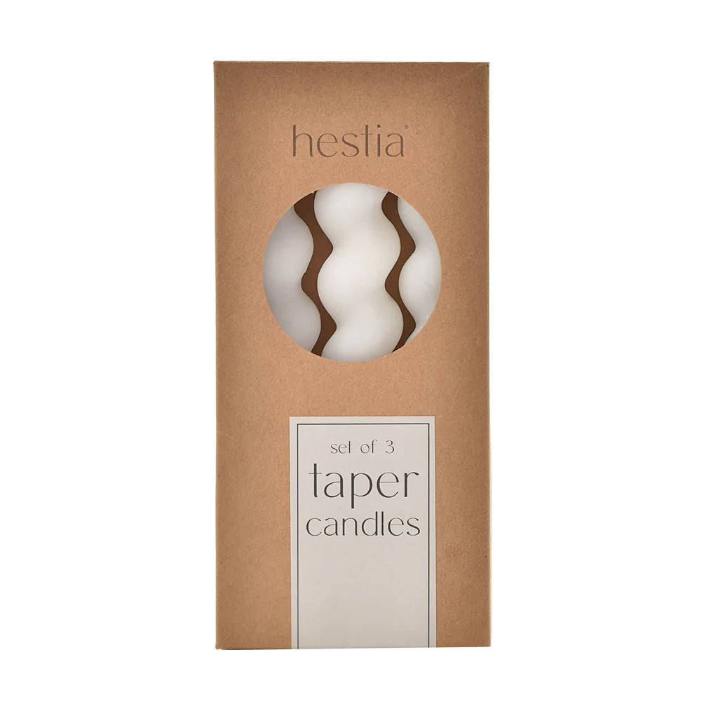 white taper candles with twisted design 