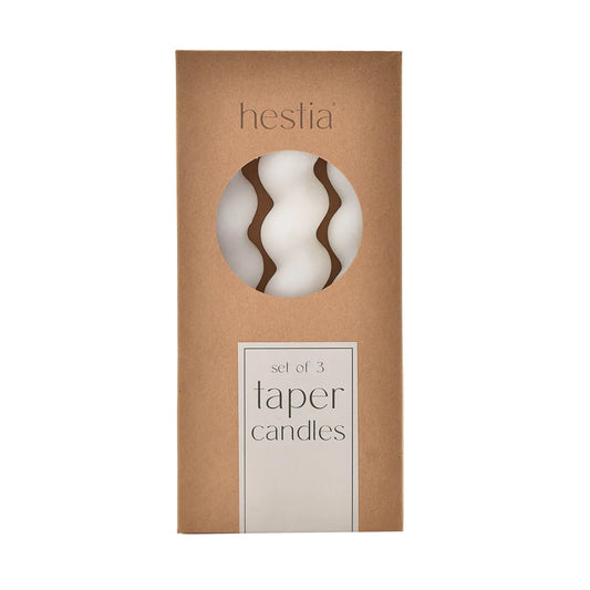 white taper candles with twisted design 