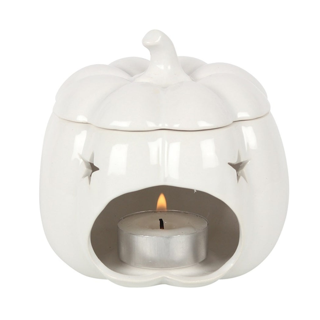 white pumpkin oil burner and wax warmer.