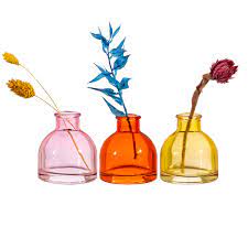 warm toned mini bud vases in pink, orange & yellow glass